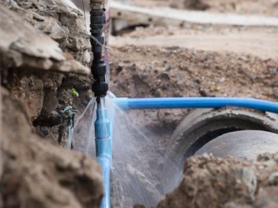 water-pipe-break-exposing-burst-water-main-focused-spraying-water-pipe_44527-849